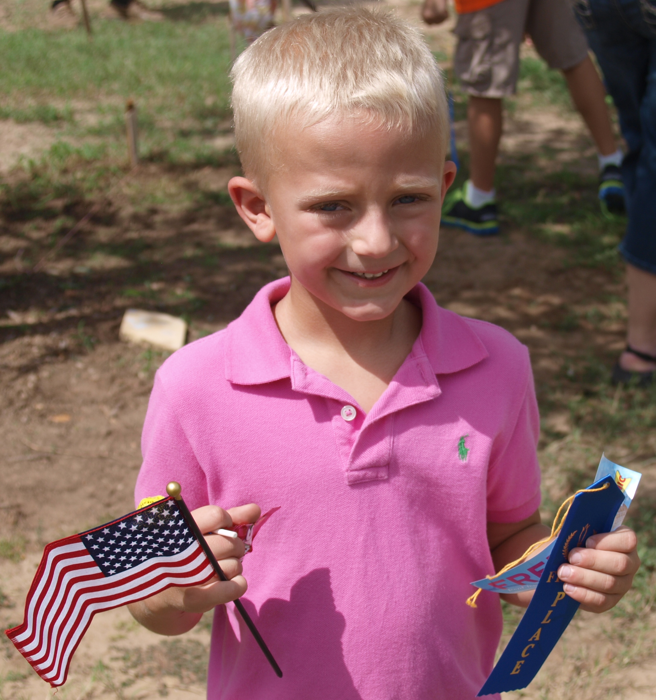 Wendish Fest 2014 – Boy Winner with American Flag – Texas Wendish Heritage